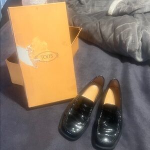 Tod's Glossy Black Leather Loafers